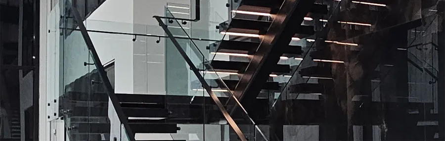 Read about the modern industrial showpiece stair project